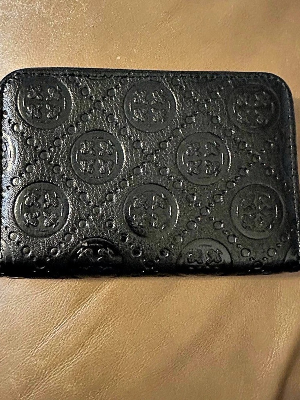 Embossed Black Zip-around Wallet